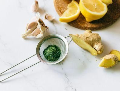 Fresh garlic, lemon, and ginger arranged as natural ingredients for immunity boost retreats