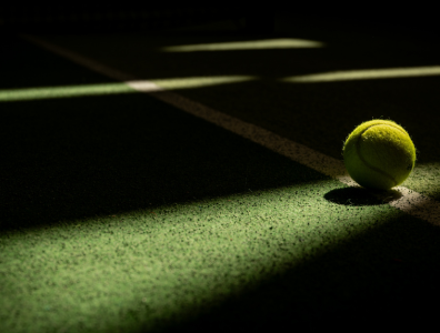 Tennis ball on a tennis court during a tennis holiday