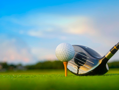 Man playing golf on a course at a luxury golf and spa holiday retreat