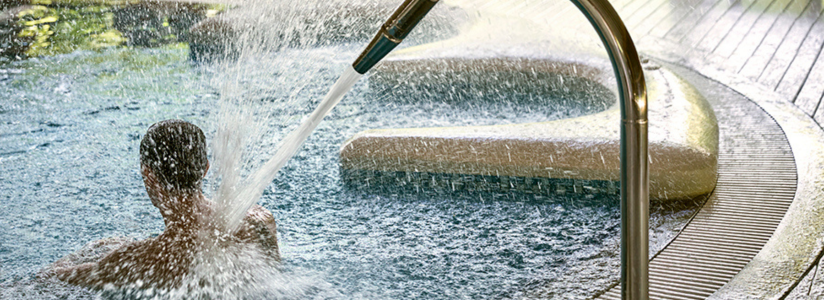 Man relaxing in thermal waters at a spa Man relaxing in thermal waters at a spa, experiencing the benefits of thalassotherapy