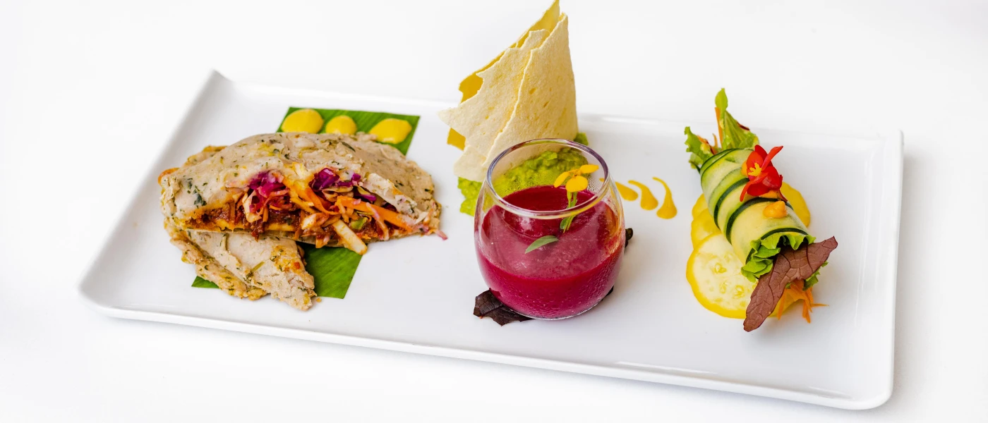 Intricately presented food on a white plate