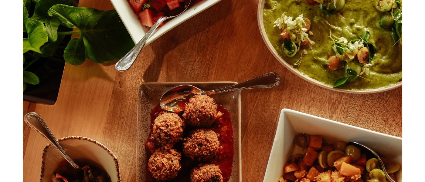 Fresh and vibrant healthy cuisine in bowls on a wooden table