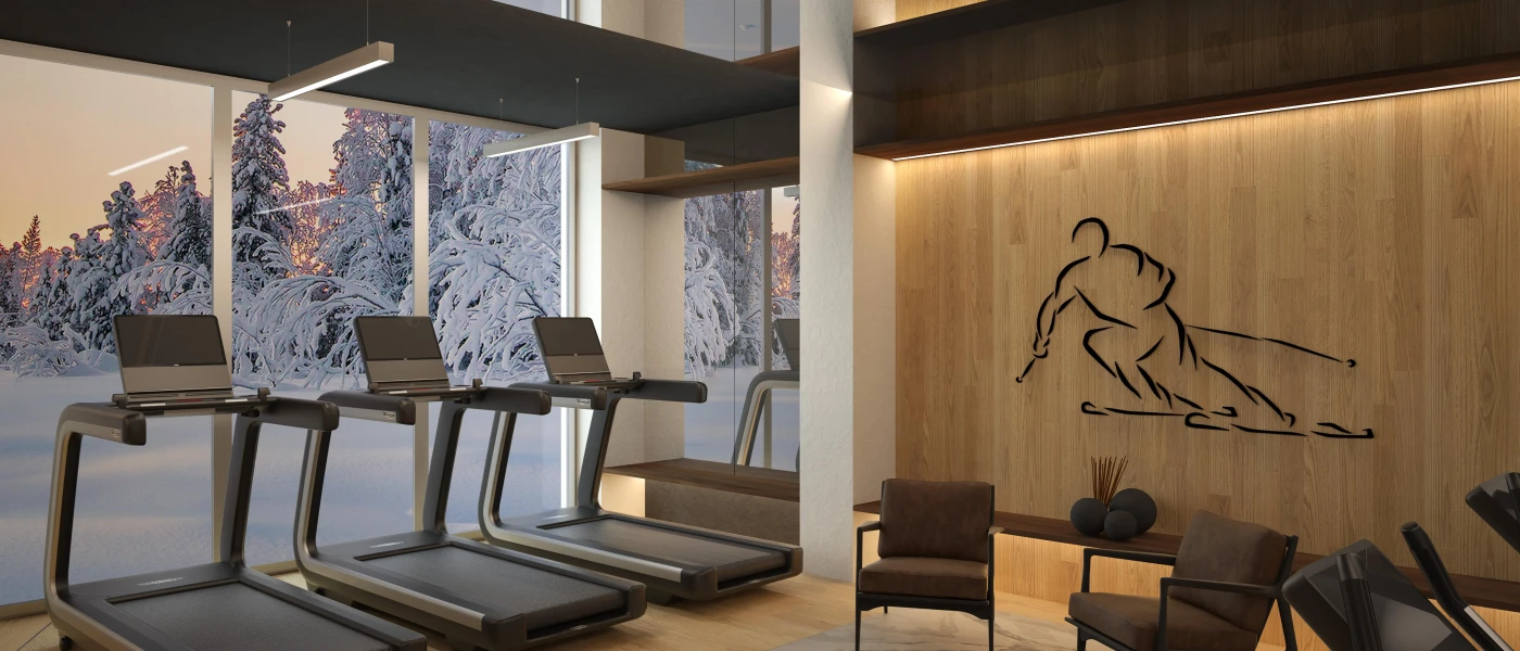 Stylish gym with treadmills overlooking a full-length window and snowy woodland, with a wood-panelled wall and a mural of a skiing figure