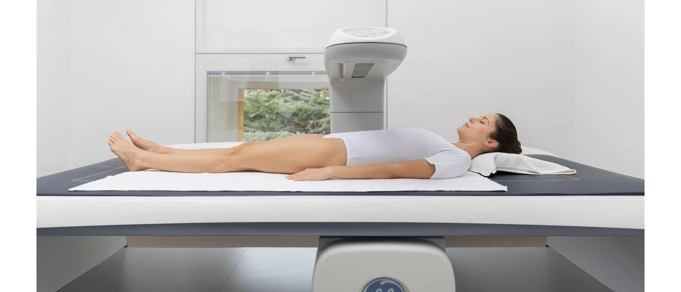 Female client doing the Dexa scanner 