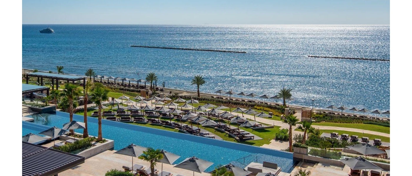 Aerial view of AMARA's outdoor pool, landscaped grounds and oceanfront location