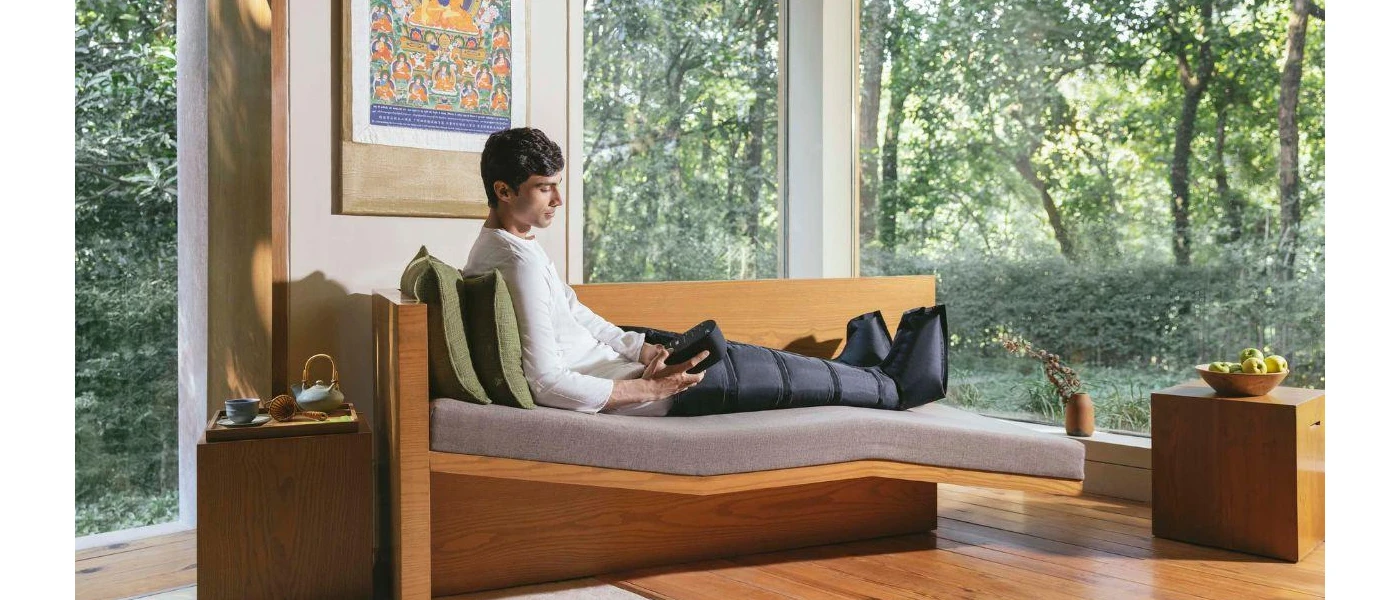 Man studies control while he relaxes in a sleeping bag for legs