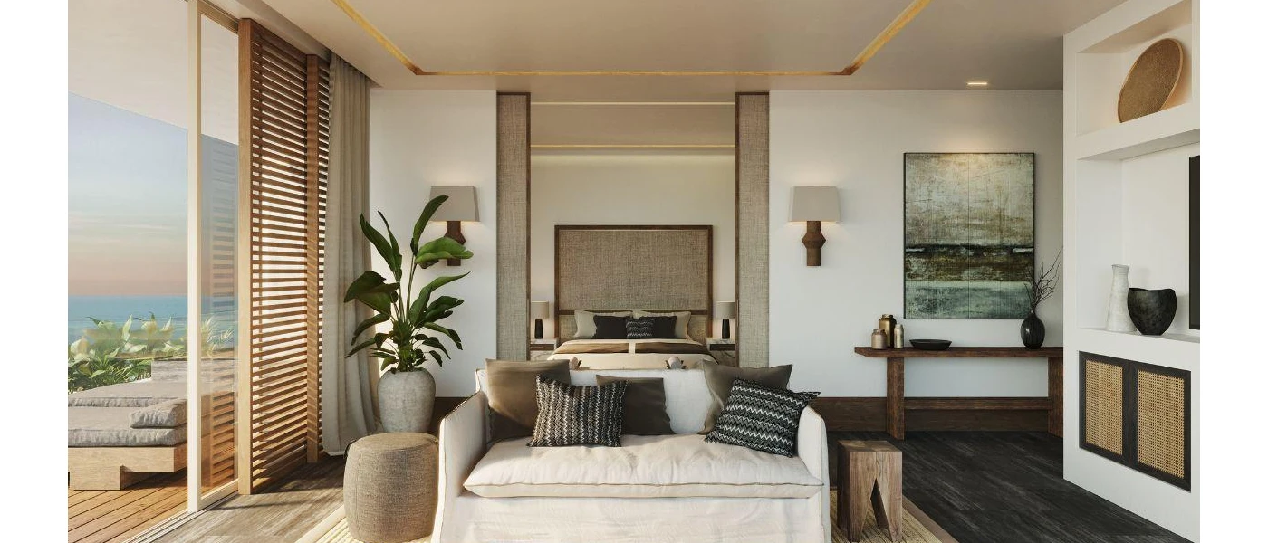 Stylish modern villa with neutral colours, a dark-wood floor, sofa with dark cushions and a bed with the same