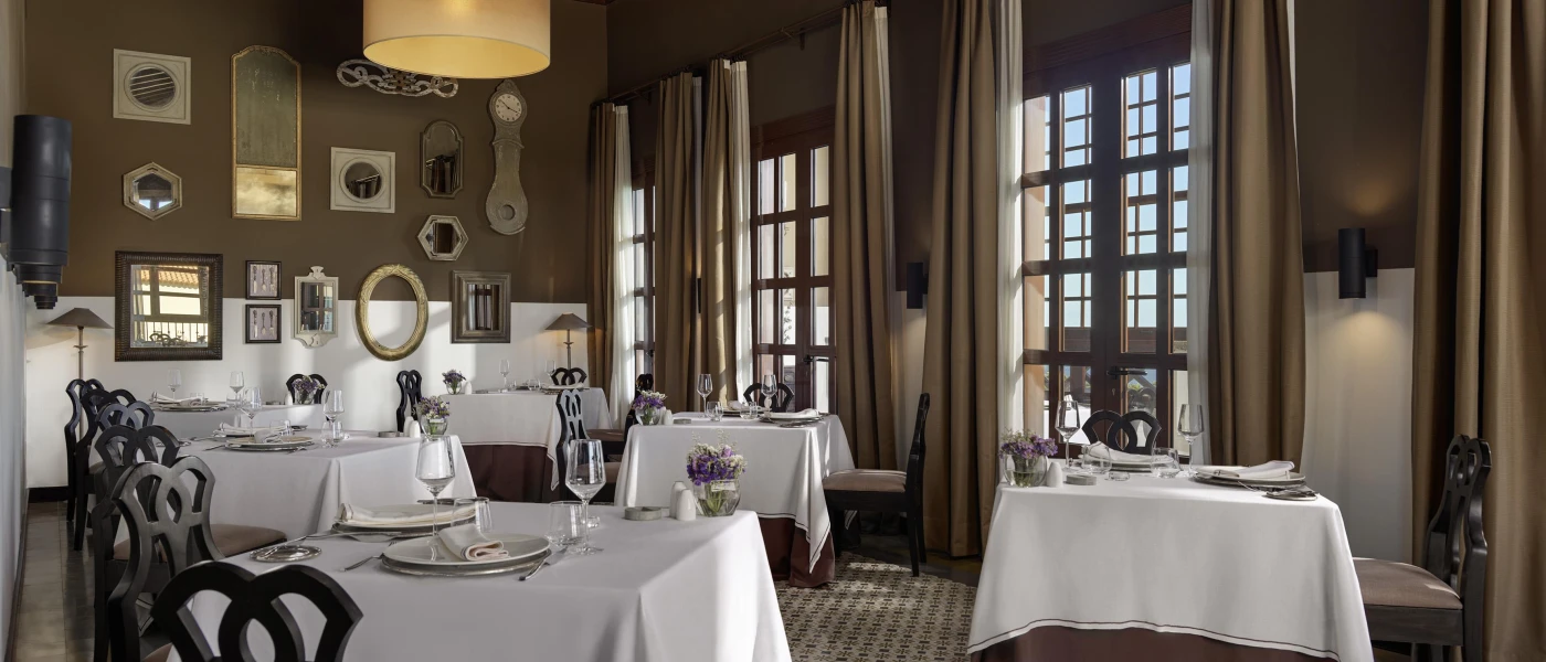 Main restaurant with dressed tables for dinner