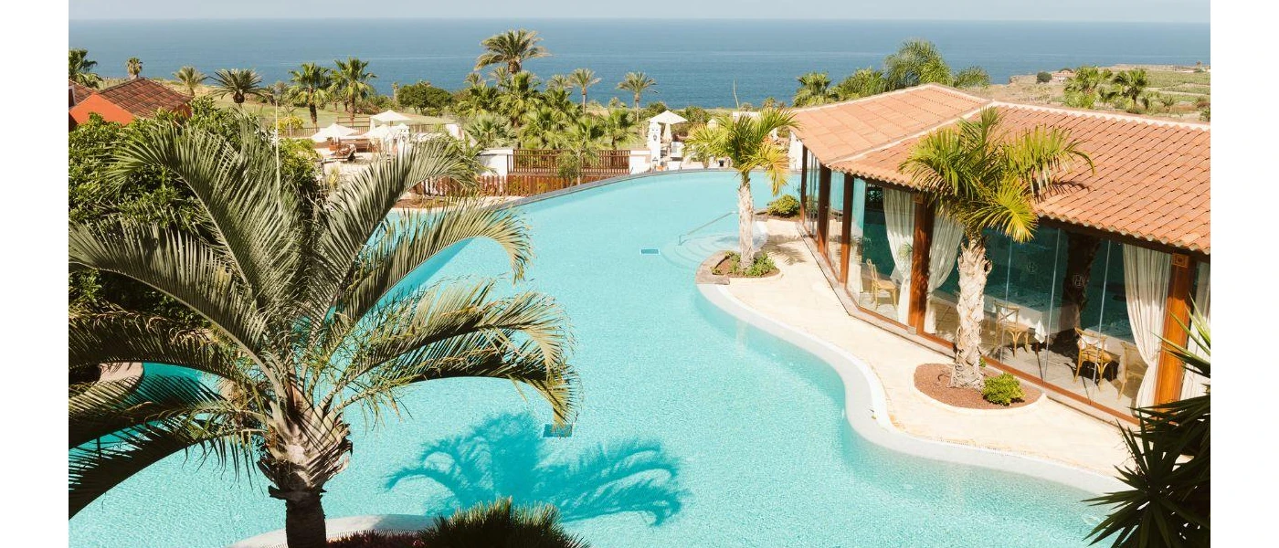 Pool at Hacienda del Conde, Tenerife, overlooking lush scenery