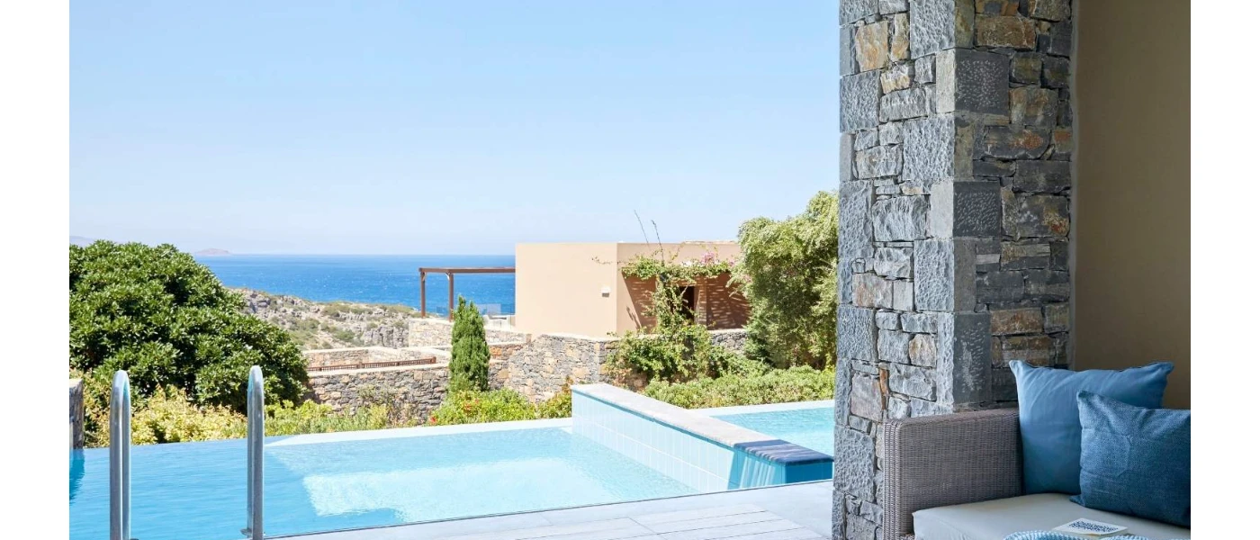 Balcony with a private pool overlooking gardens and the sea