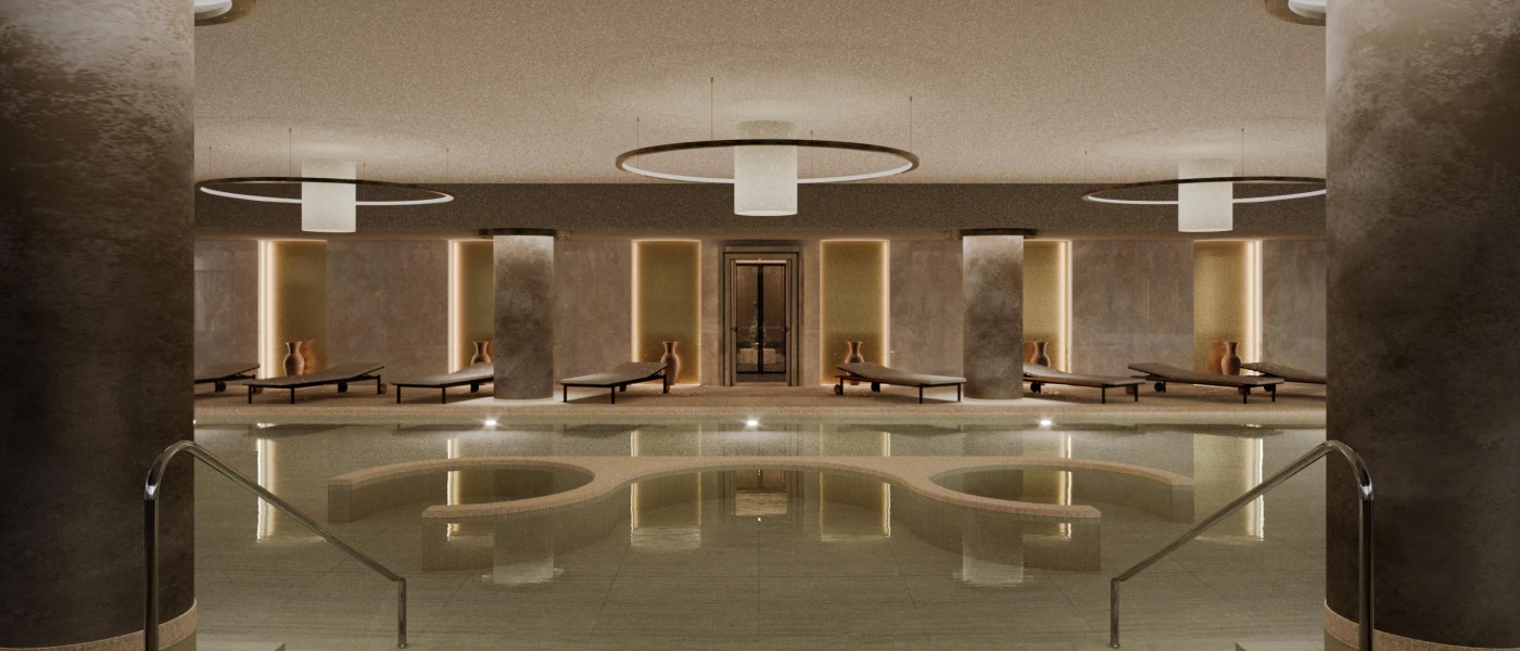Chic indoor pool area with grey marble-like walls and pillars, contemporary pendant lights, and LED lighting with vases lined along the back wall