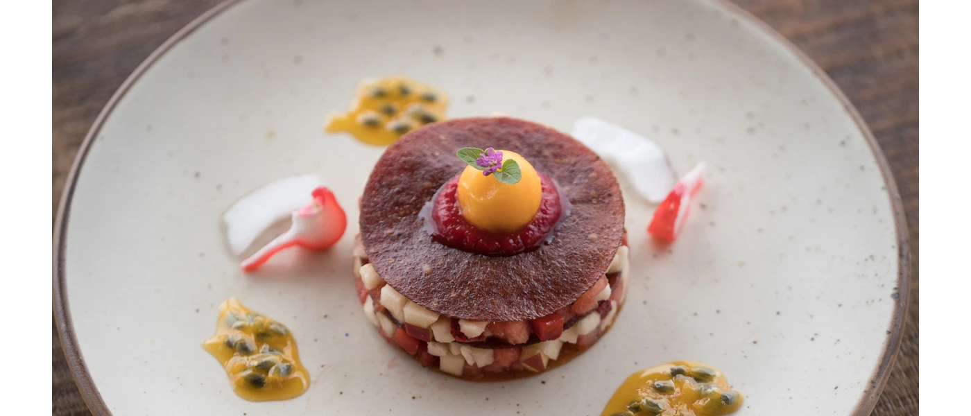 Plate with a stack of healthy looking colourful vegetables