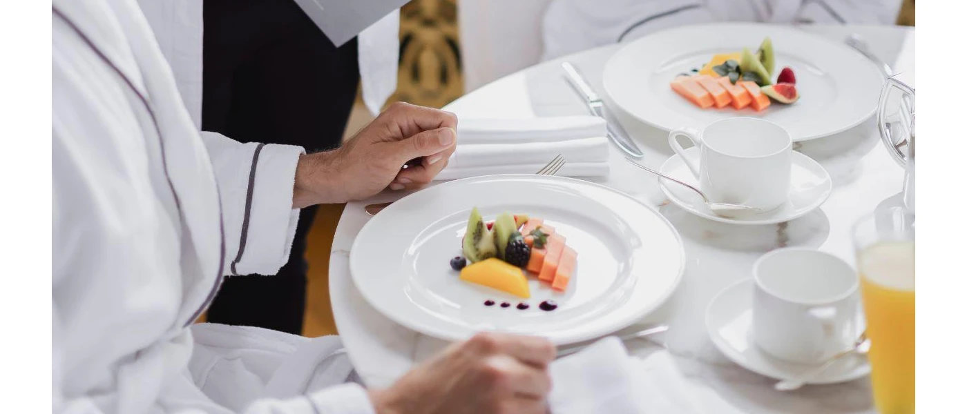 Couple enjoying healthy fruit salad for breakfast