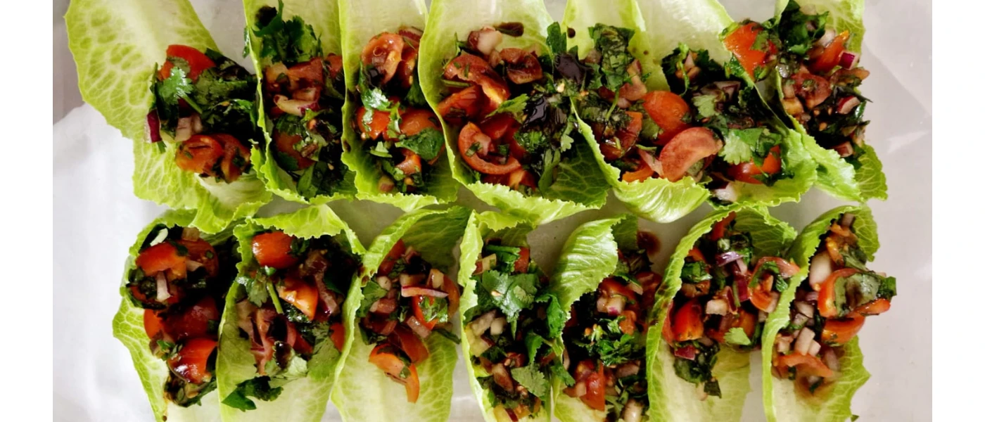 Neatly presented food in lettuce boats