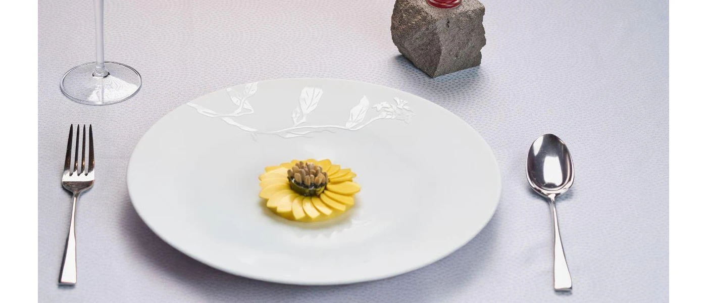 Beautifully presented food in the shape of a yellow flower