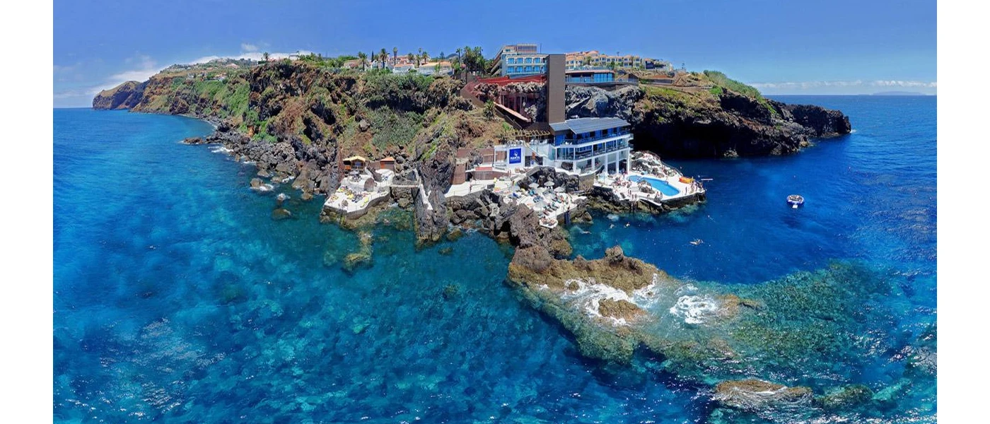 Aerial view of Sentido Galomar swimming pool, lido sunbathing terrace and hotel buildings