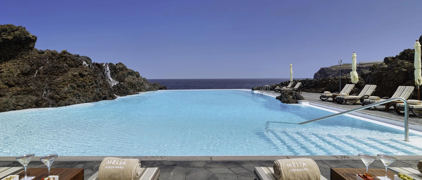 Pool at Hacienda del Conde, Tenerife, overlooking lush scenery