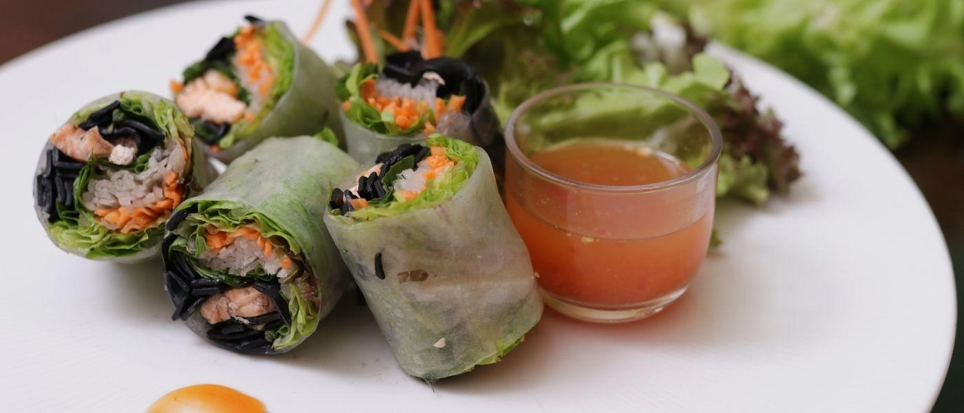 Tofu spring rolls with side cause and salad