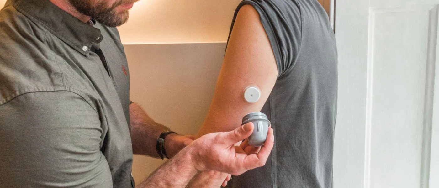 Medical professional performing a health assessment on a female patient