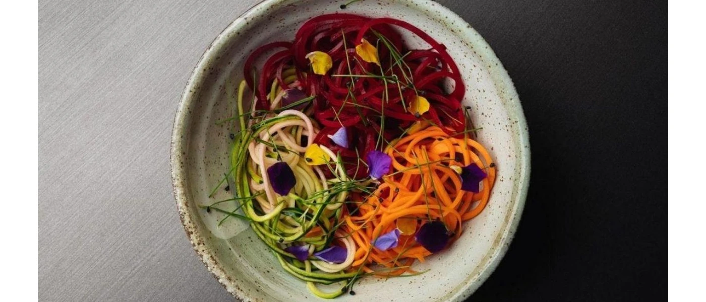Bowl of vegetables with herbs laced on top