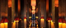 Softly lit corridor with dark pillars and hanging lanterns