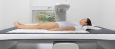 Female client doing the Dexa scanner 