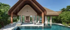Thatched-roof villa with a large furnished terrace, a private pool and surrounding greenery