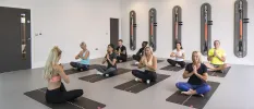 Group participating in an indoor yoga class