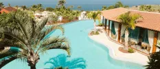 Pool at Hacienda del Conde, Tenerife, overlooking lush scenery
