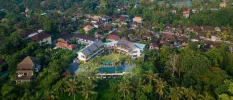 Aerial view of Rudra Sahashrara rooftops and pool, tucked among tropical gardens