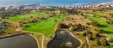 Aerial view of golf course and beach and Atlantic Ocean 