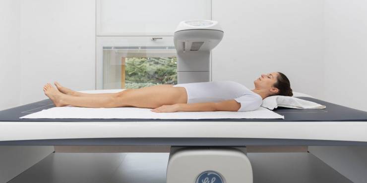 Female client doing the Dexa scanner 