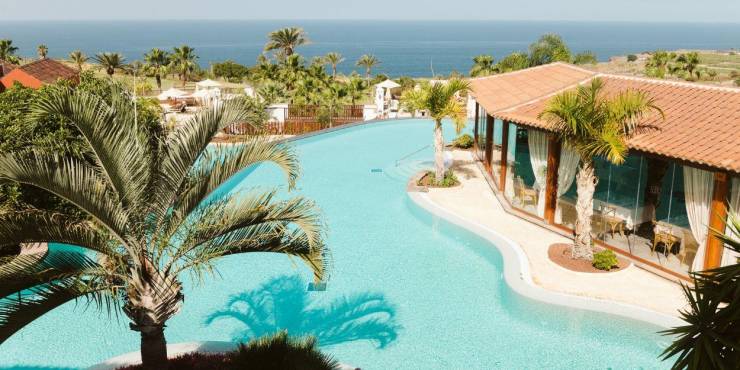Outdoor swimming pool of Hacienda del Conde, Tenerife Pool at Hacienda del Conde, Tenerife, overlooking lush scenery